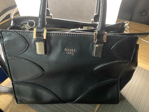 Guess black handbag has - black,