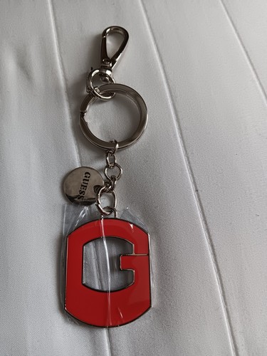 Original guess bag charm with - bag,
